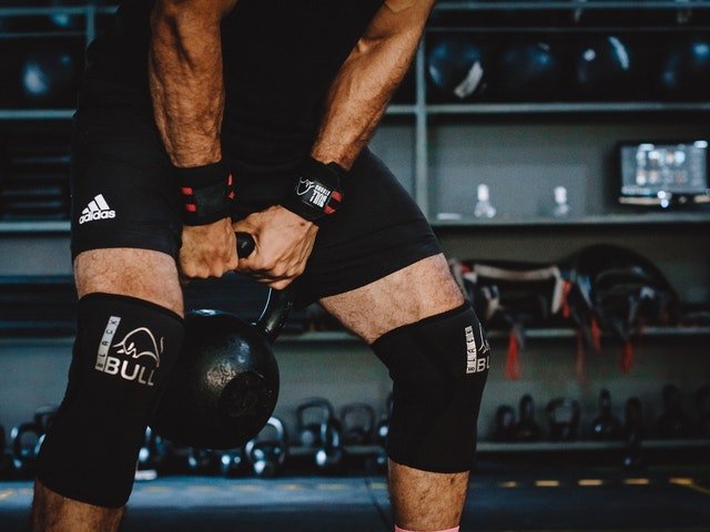 Biceps Sore After Kettlebell Swings? (5 Reasons Why This Might Be)