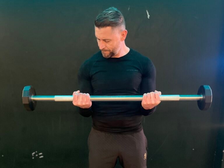 Are Bicep Curls Bad for the Rotator Cuff? (Causes & How to Protect Your Shoulders)