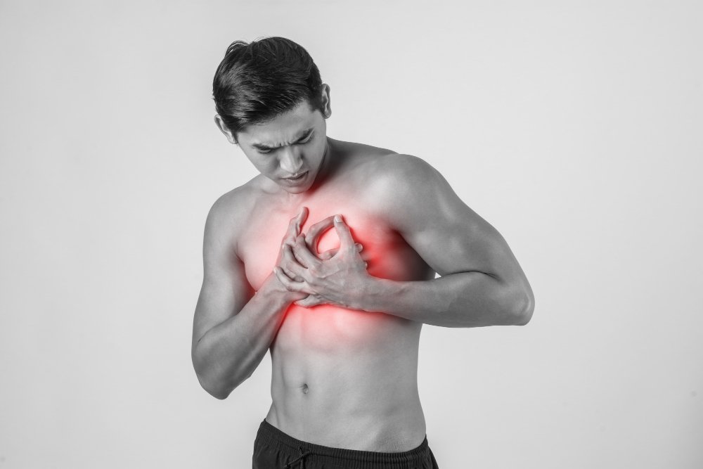 Why do I get chest pain when doing sit ups?
